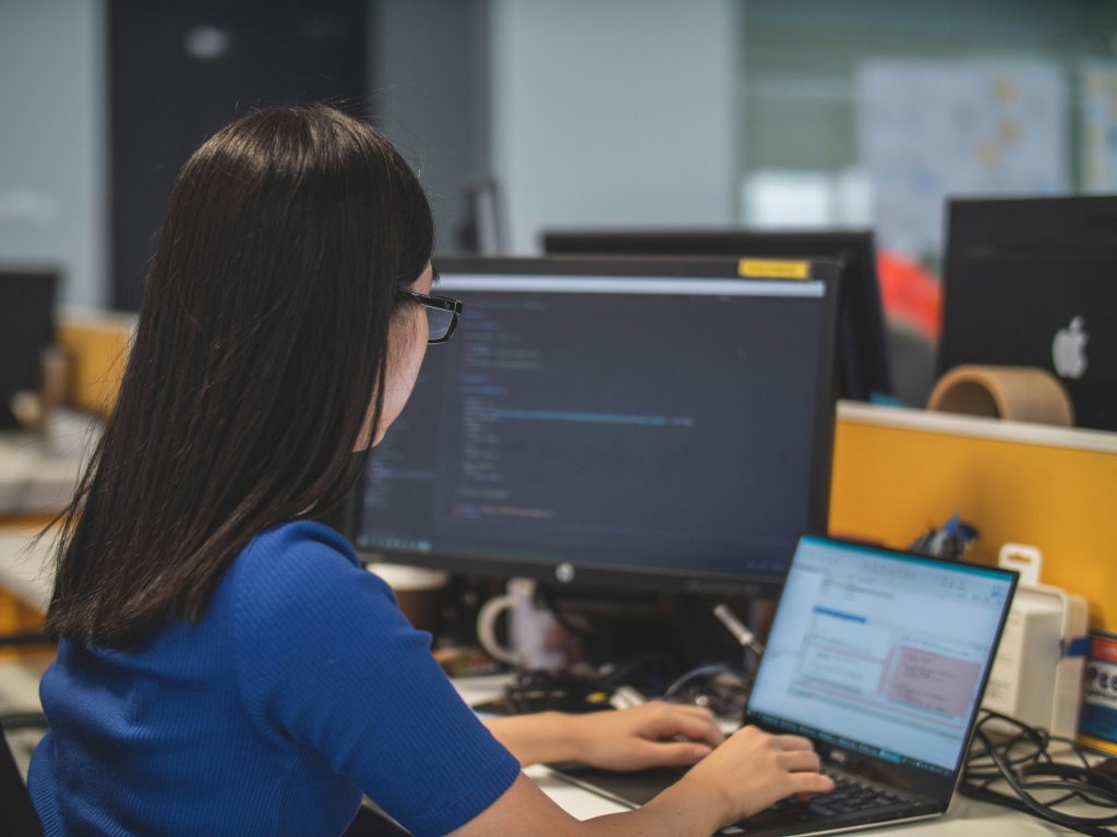 employee using laptop at work